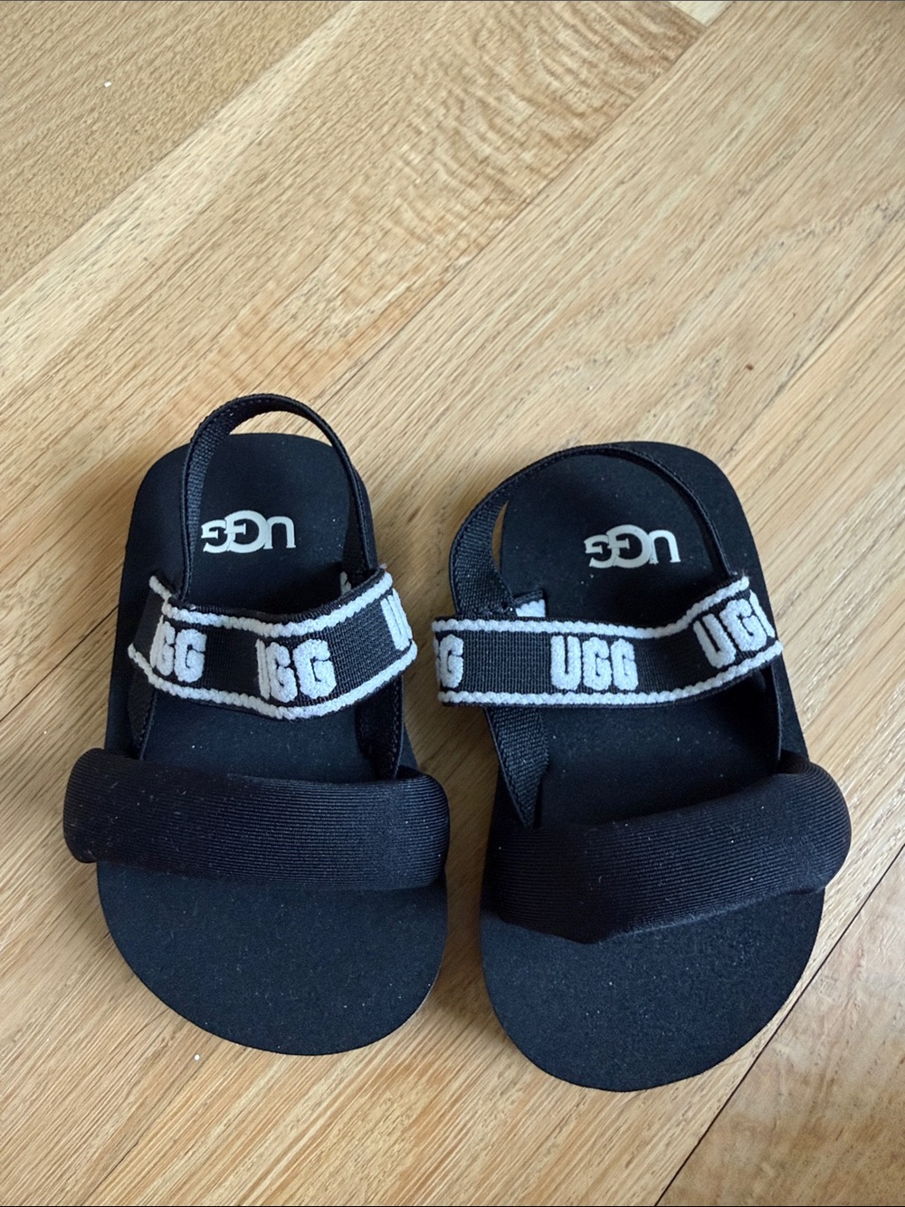 UGG Kids Black Sandals with White Logo Strap